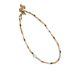 Bohemian handmade necklace featuring baroque pearls and colorful cylindrical beaded design