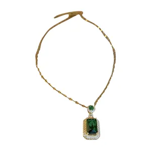 Vintage square emerald pendant necklace with sparkling cubic zirconia on gold chain