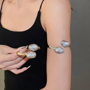 Elegant French vintage gold arm cuff with irregular baroque pearls for high-end look