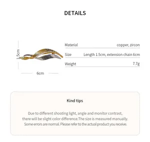 Détail macro de la broche feuille en zircon montrant les matériaux et les mesures