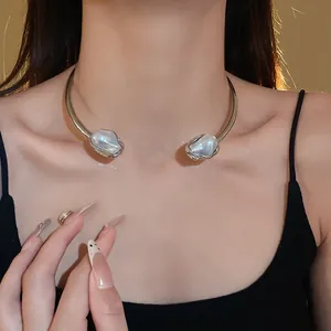 Elegant French retro silver choker with two irregular baroque faux pearls on model