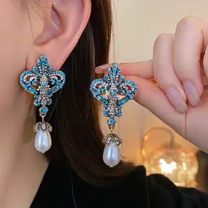 Exquisite vintage rhinestone pearl drop earrings with blue crystals for luxury look