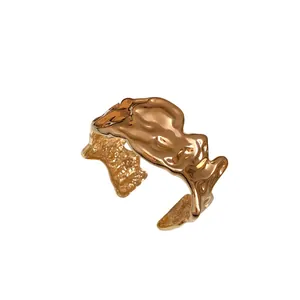Irregular crumpled gold open cuff bracelet with textured liquid metal design for women