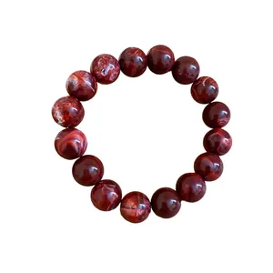 Elegant red marbled smudge beaded bracelet featuring a vintage Chinese aesthetic design
