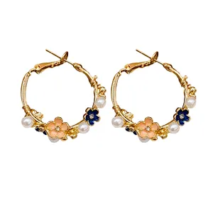Elegant gold-plated hoop earrings with delicate enamel flowers and faux pearls on S925 silver needles