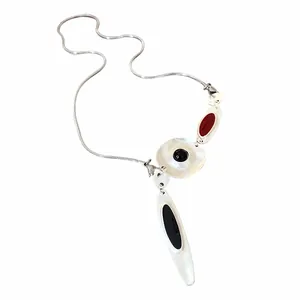 Modern silver irregular metallic necklace with chic black and red enamel round pendants