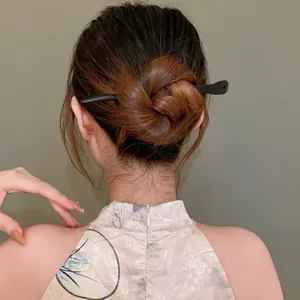 Minimalist handcrafted peach wood hair stick for elegant Neo-Chinese bun hairstyles
