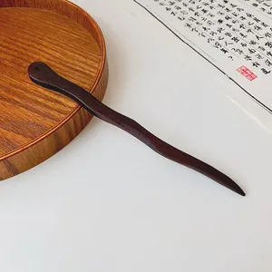 Elegant dark peach wood hair stick with minimalist wavy design for Hanfu styling