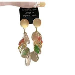 Geometric shell tassel dangle earrings in colorful translucent finish with silver 925 card.