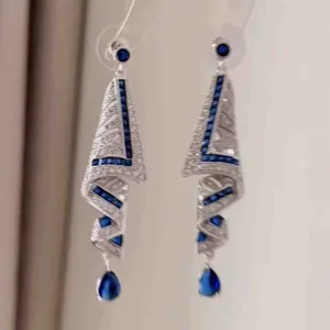 Elegant ethnic style skirt-shaped dangle earrings with sparkling blue and white stones