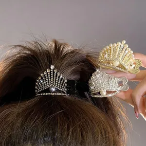 Elegant crown hair claw with sparkling rhinestones and pearls for ponytail