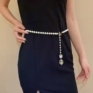 Elegant baroque pearl waist chain with bird accent and crystal tassel pendant for women