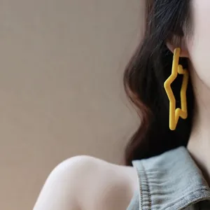 Fashionable yellow star-shaped geometric earrings for women with simple sweet style