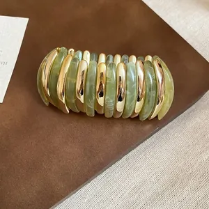 Modern marbled sage green and metallic gold segmented chunky stretch bangle for women