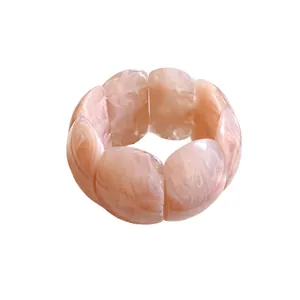 Chic marbled acrylic stretch bracelet with pink and white smudged pattern