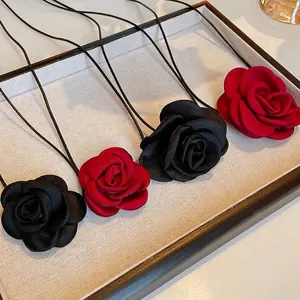 Fabric rose choker necklace with leather cord for sweet and cool style.