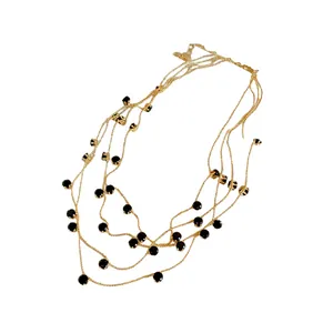 Collier doré multicouche élégant avec pierres de zircon noir circulaire pour femme
