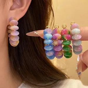 Elegant resin beaded hoop earrings with silver needles in romantic pastel candy colors