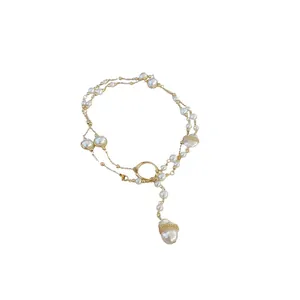 Retro irregular faux pearl pendant necklace with elegant gold-toned chain details