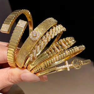 Elegant 18k gold plated geometric bangles set featuring sparkling cubic zirconia stones