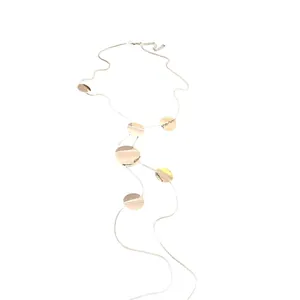 Minimalist gold tassel necklace with polished round discs for women