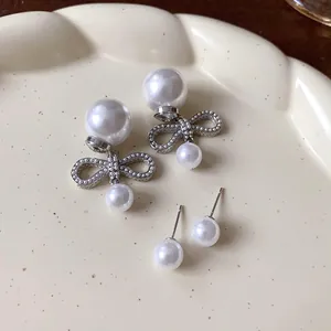 Eleganti orecchini a fiocco con perle e perni rimovibili per un doppio stile d'uso