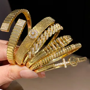 Close-up of luxury 18k gold plated zircon bracelets with various geometric designs for women