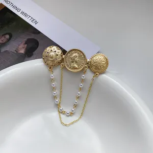 Vintage gold brooch with Queen Elizabeth coin relief and elegant pearl hanging chains