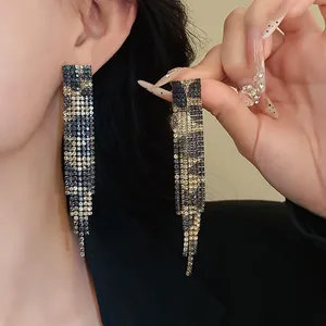 Detailed view of luxury leopard print rhinestone drop earrings for a vintage look