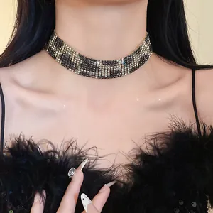 Detailed view of an elegant wide rhinestone leopard print choker necklace for women