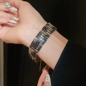 Close-up detail of a vintage wide rhinestone bracelet with leopard print pattern