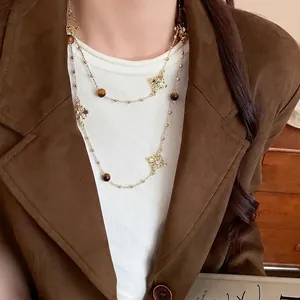 Elegant vintage double-layer cross necklace with rhinestones and brown tiger eye beads