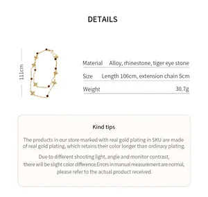 Detailed product specifications of a vintage rhinestone cross and tiger eye stone long necklace