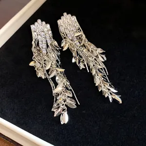 Elegant silver needle zircon earrings with wheat leaf tassel design for a chic fashion statement.