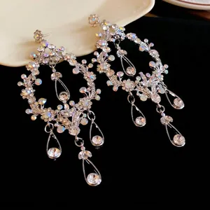 Exaggerated silver needle rhinestone hollow teardrop tassel earrings for elegant evening gala