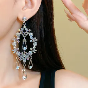 Detailed view of luxury silver rhinestone teardrop tassel fringe earrings for women