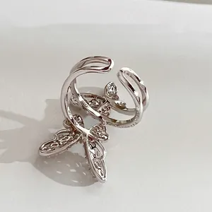 Elegant silver hollow butterfly open ring with sparkling zircon accents for women.