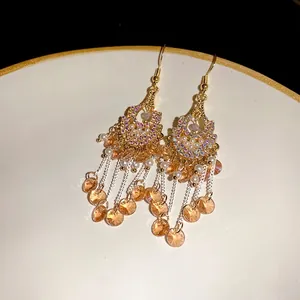 Elegant gold Bohemian hook earrings with pearls, crystals and champagne glass tassels