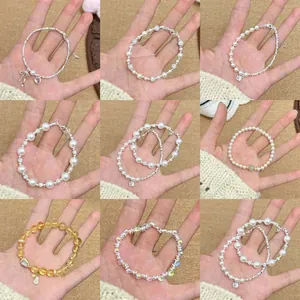 Bracelet Vintage Français en Perles Artificielles pour Femmes Luxe Strass Cœur Nœud Papillon Camélia Charm Bracelet Bijoux