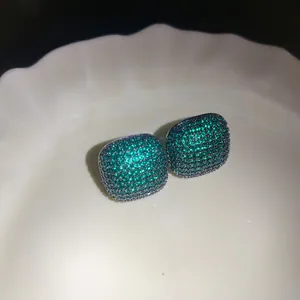 Vintage square stud earrings detail paved with sparkling green zircon and silver needle