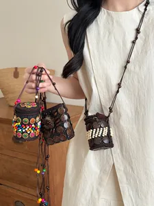 Handmade ethnic necklaces made of coconut shells and vibrant colorful wooden beads