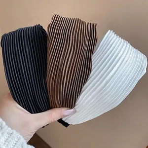 High top pleated wide headband set featuring black, brown, and white textured fabrics