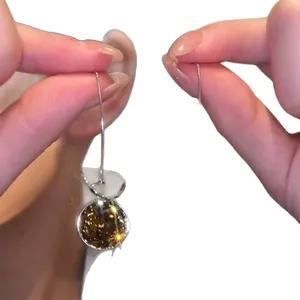 Vintage geometric rhinestone drop earrings with a sparkling gold finish for women.