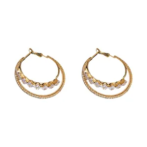 Elegant 18k gold plated double hoop earrings featuring sparkling cubic zirconia stones