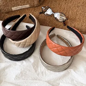 Stylish quilted leather headbands in multi-colors to create a trendy high-top hairstyle.