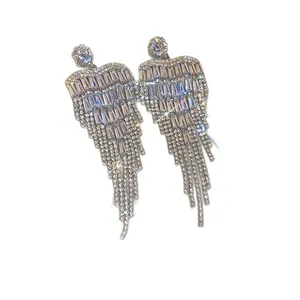 Luxury silver-toned tassel earrings with shimmering zircons for a high-end look.