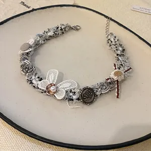 Elegant retro tweed choker necklace with white lace butterfly and silver rose charms