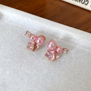 Elegant pink pearl flower stud earrings with sparkling crystals in a French romantic style