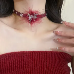 Detailed view of burgundy plush choker with silver butterfly star pendant for women.