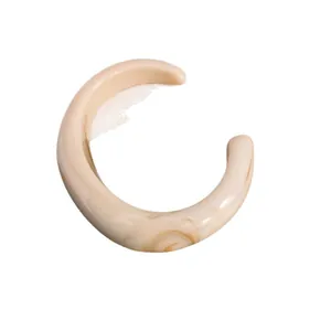 Elegant acrylic geometric C-shaped open bangle with a luxury cream marbled texture